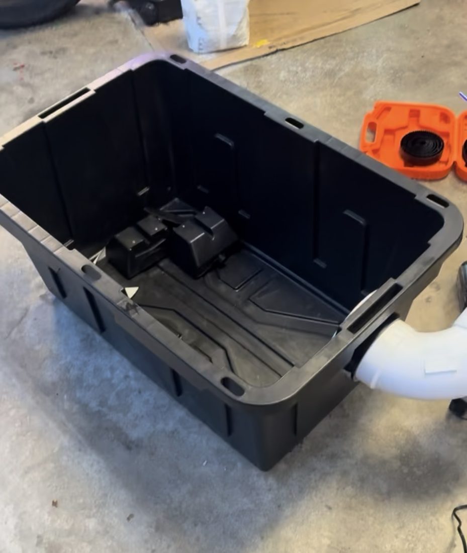 Inside of the bin with the elbow fitted