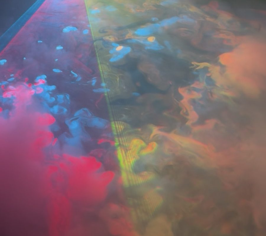 Red and green laser sheets lighting up low fog
