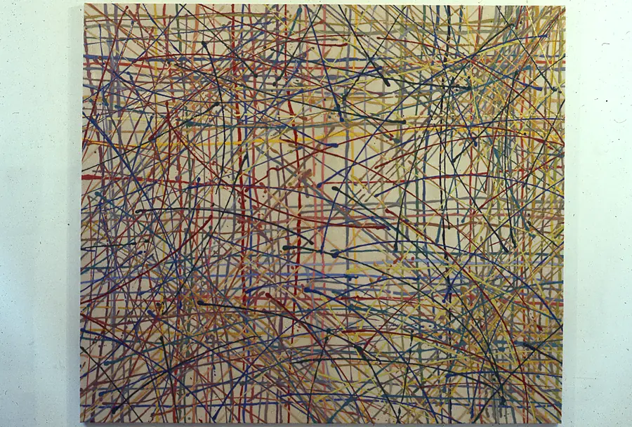 Square abstract painting of a dense web of poured colored lines on a cream ground.