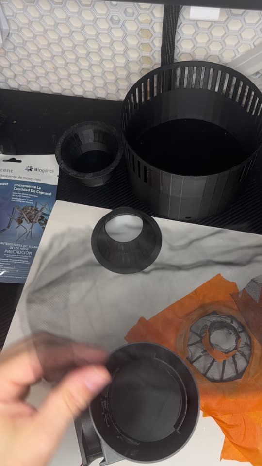 A paper template taped down for cutting the mesh